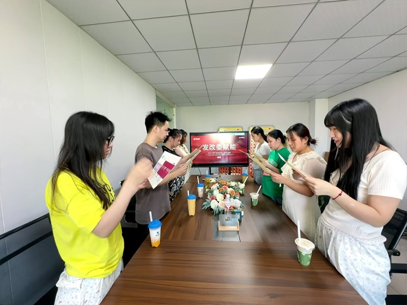 Team reading together in office meeting room