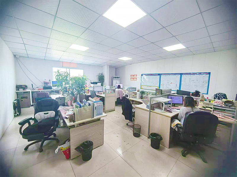 Employees working in open office space