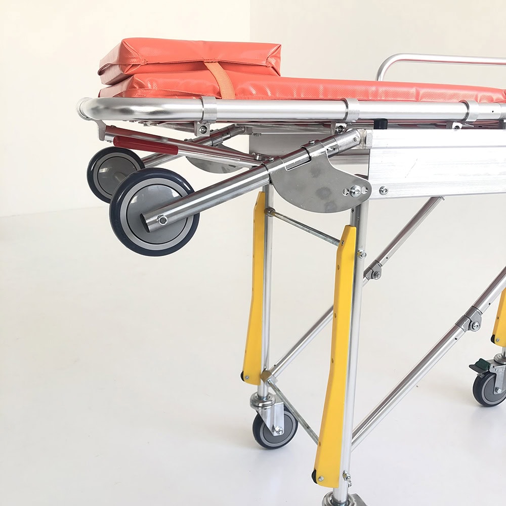 Aluminum alloy ambulance stretcher with adjustable wheels and orange mattress