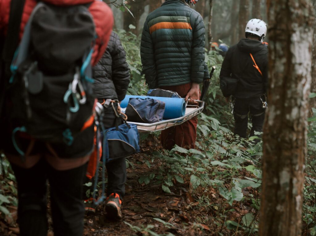 Mountain rescue team carrying stretcher