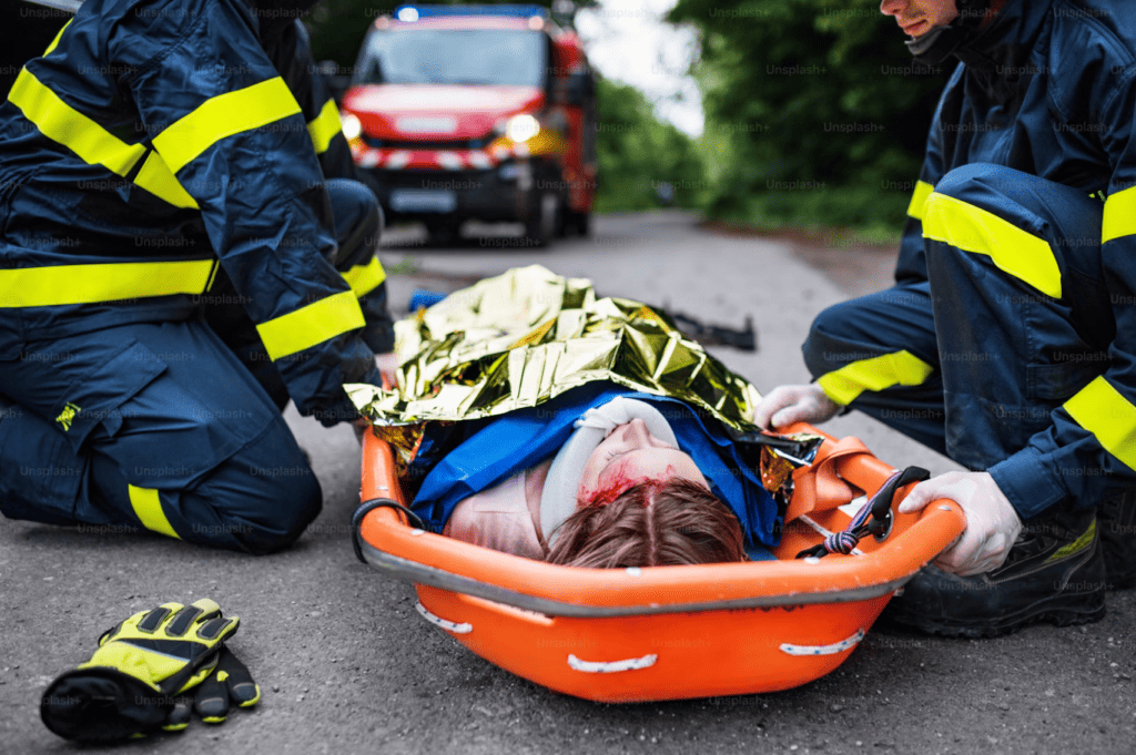 Firefighters using stretcher for emergency rescue