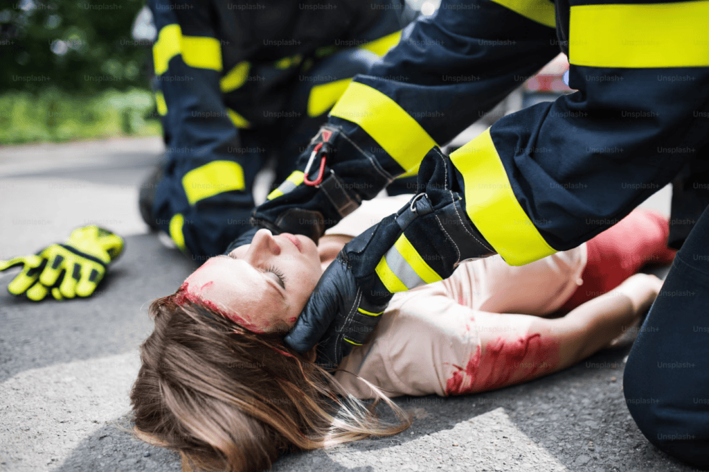 Emergency responders providing cervical spine support